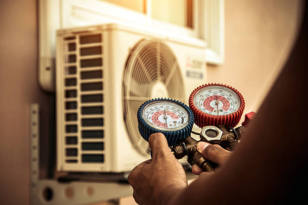 Professional Hvac technician working in Highland, IL